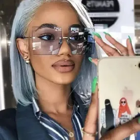 Get Noticed with Trendy Oversized Rimless Sunglasses!
